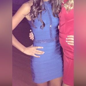 Blue, high neck dress.